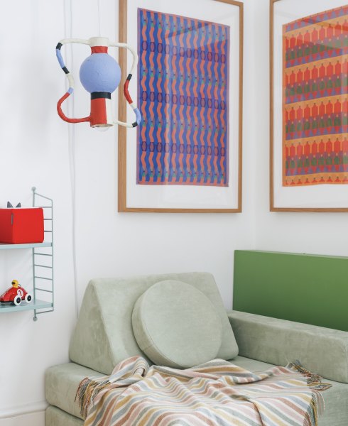 Sage green possum play couch, sculptural pendant light, Yinka Ilori tea towels